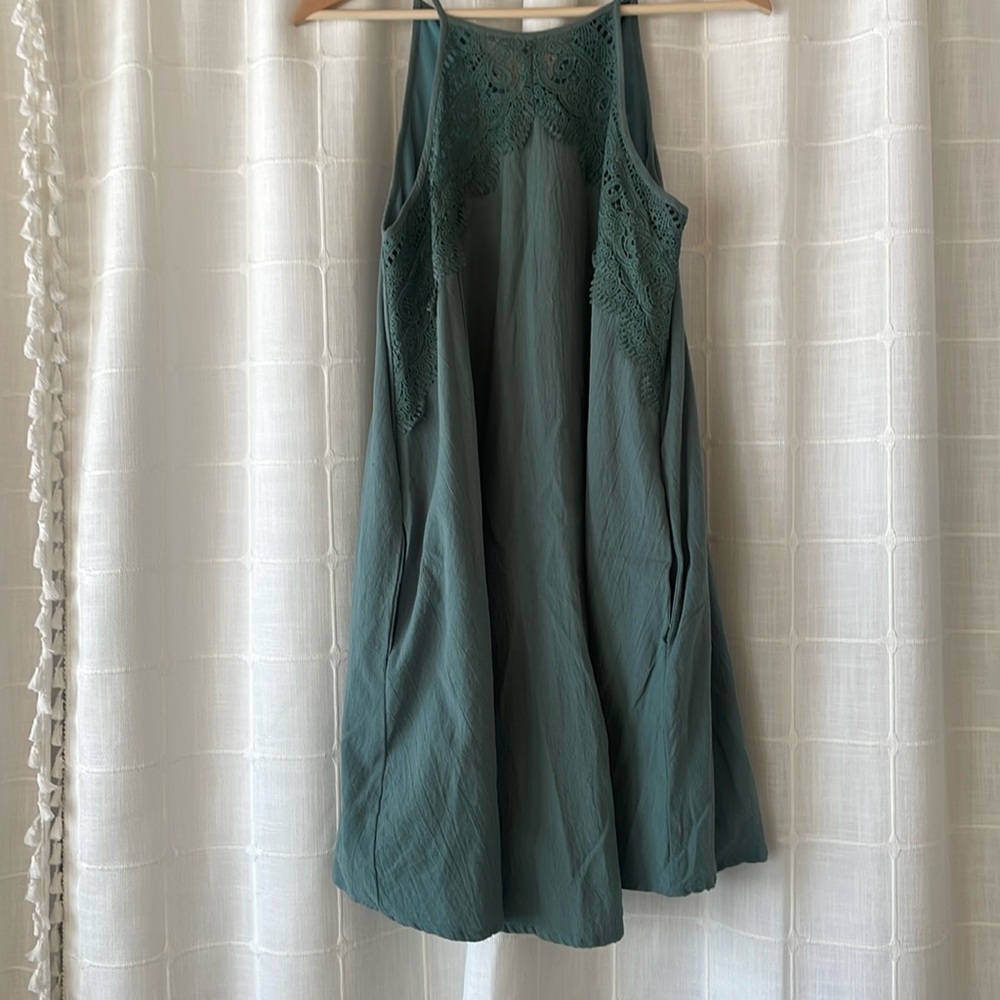 J.NNA small green dress with pockets and lace